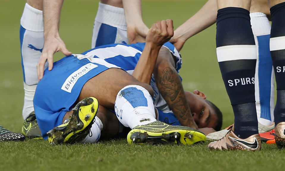 Football Soccer - Colchester United v Tottenham Hotspur - FA Cup Fourth Round - Weston Homes Community Stadium - 30/1/16 Colchester United's Alex Wynter lies injured Action Images via Reuters / Paul Childs Livepic EDITORIAL USE ONLY. No use with unauthorized audio, video, data, fixture lists, club/league logos or "live" services. Online in-match use limited to 45 images, no video emulation. No use in betting, games or single club/league/player publications. Please contact your account representative for further details.