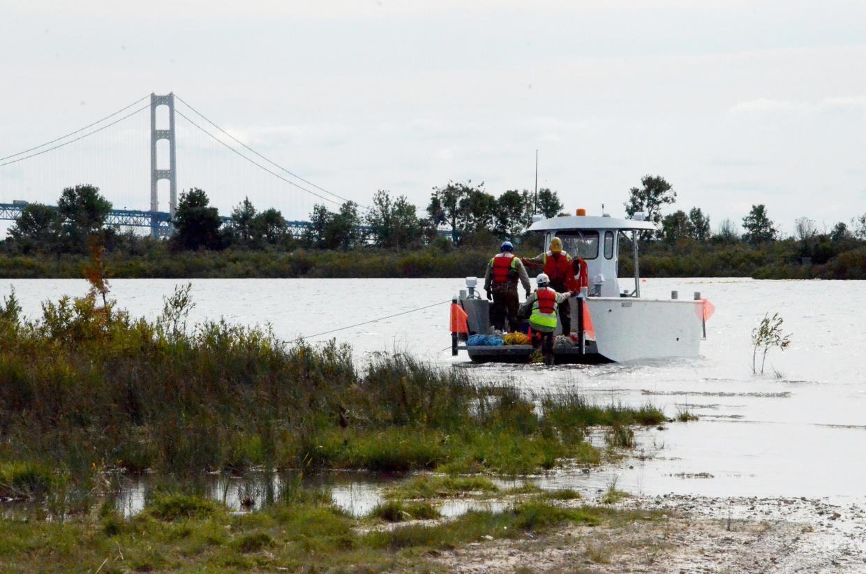 Enbridge personnel and other local agencies conduct an oil spill drill in the Straits of Mackinac in 2015.