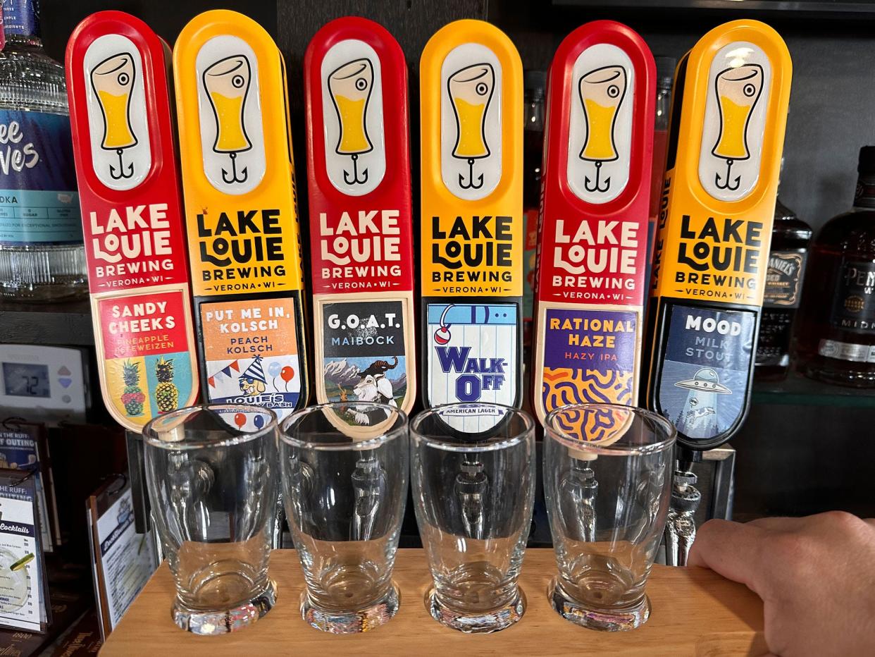 The beer taps at the Dockhaus at Wisconsin Brewing Company Park in Oconomowoc shows the various brews it has on hand, including the custom-label Walk-Off Lager made for the Dockhounds baseball team. The Dockhaus brings activity to the ballpark in the off-season months.