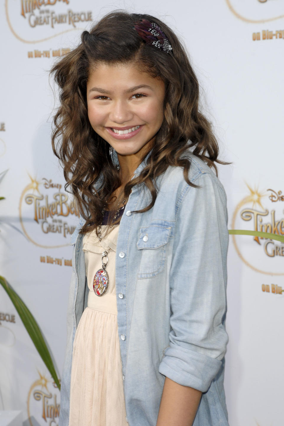 young Zendaya smiling at an event