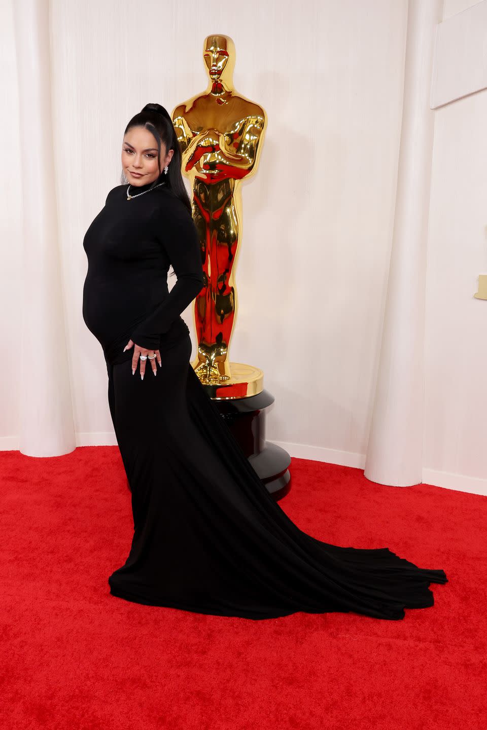 vanessa hudgens reveals her baby bump on the oscars red carpet 2024