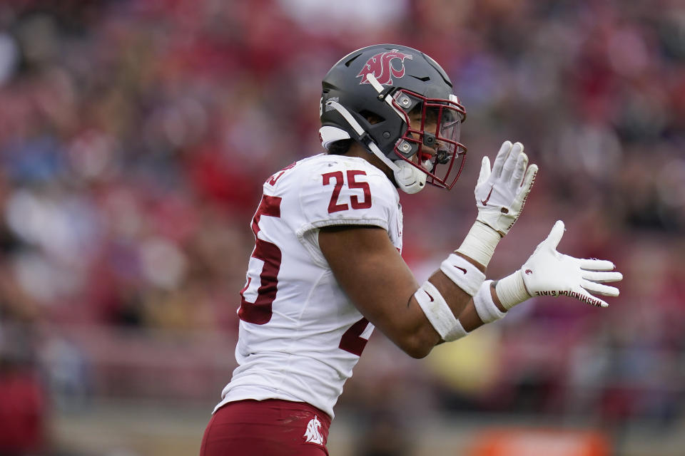 Washington State defensive back Jaden Hicks (25) celebrates after returning a fumble recovery for a touchdown against Stanford during the first half of an NCAA college football game in Stanford, Calif., Saturday, Nov. 5, 2022. (AP Photo/Godofredo A. Vásquez)