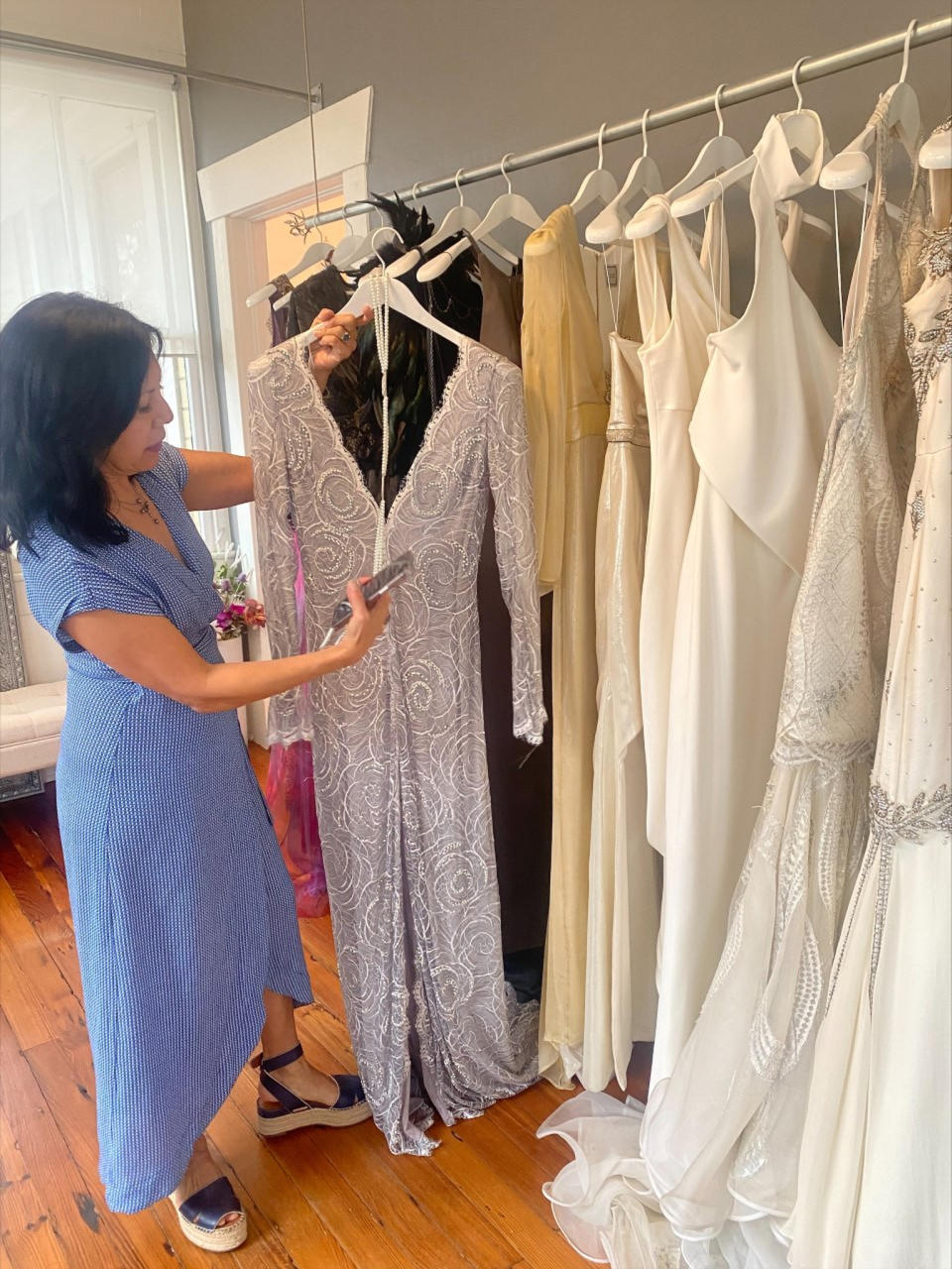 Austin-based designer Linda Asaf showing off her custom gowns - Credit: Kaley Roshitsh/WWD