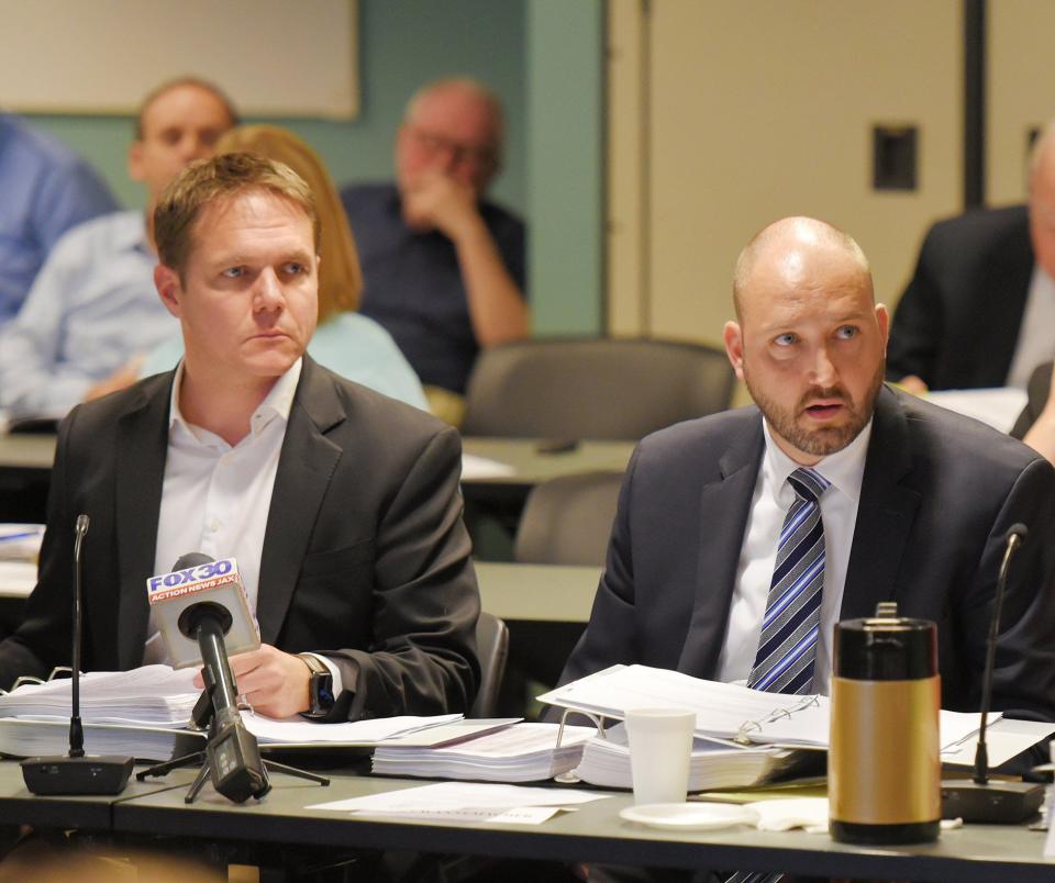 Ryan Wannemacher, at right, sits next to Aaron Zahn while fielding questions on Dec. 16, 2019 from City Council members about a controversial bonus plan. Wannemacher was chief financial officer and Zahn was chief executive officer of JEA.