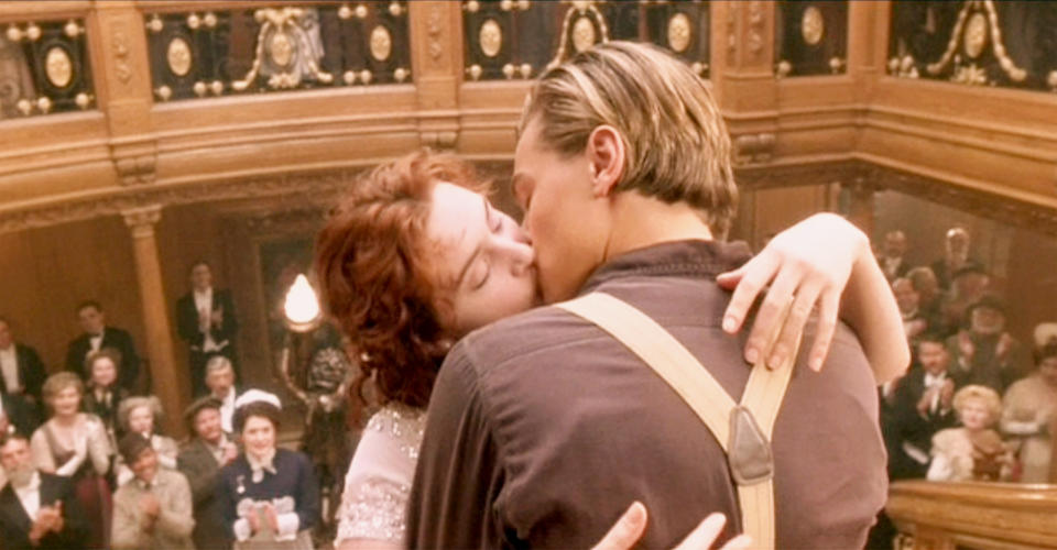 Leonardo DiCaprio kisses Kate Winslet in Titanic. 