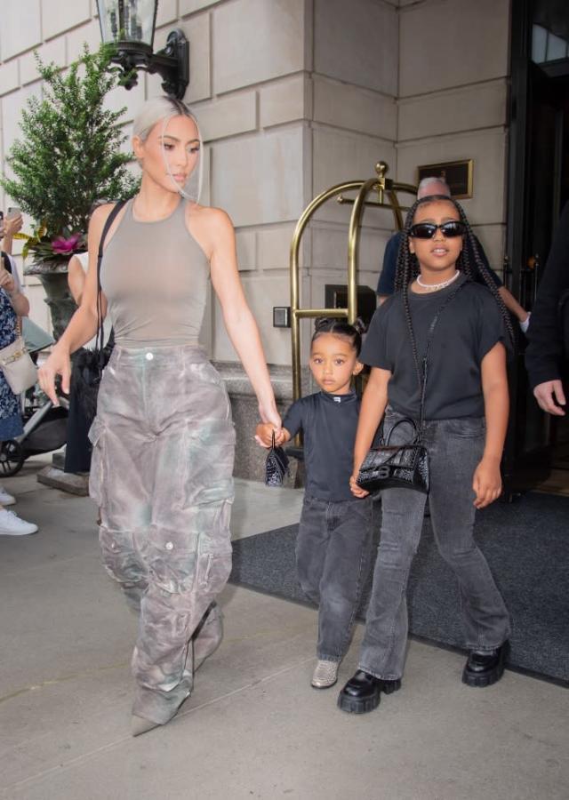 Kim Kardashian Matches Her Silver Hair to Her Outfit With Oversized Camo  Pants and Silver Boots With Kids in New York