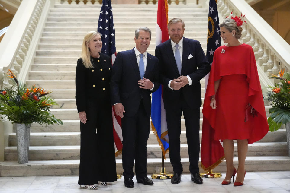 King Willem-Alexander and Queen Maxima of the Netherlands pose for a photograph with Georgia Gov. Brian Kemp, second from left, and First lady Marty Kemp, left at the Georgia State Capitol Building Monday, June 10, 2024, in Atlanta. (AP Photo/John Bazemore)