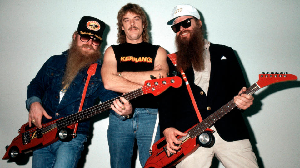 AUGUST 20, 1983: DONNINGTON PARK Photo of Billy GIBBONS and ZZ TOP and Dusty HILL and Frank BEARD, L-R: Dusty Hill, Frank Beard and Billy Gibbons - posed, group shot, backstage at Monsters Of Rock, Hot Rod shaped guitars