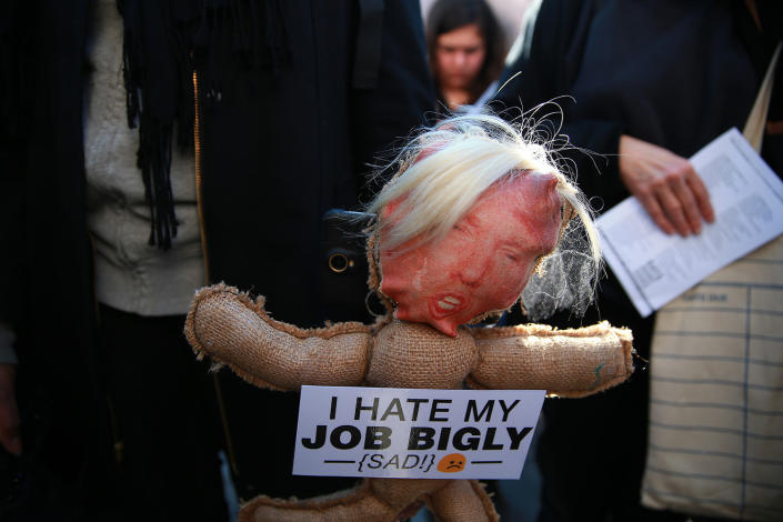 <p>A participant carries a Trump head on a stick at the “A Mock Funeral for President’s Day” rally at Washington Square Park in New York, Feb. 18, 2017. (Gordon Donovan/Yahoo News) </p>