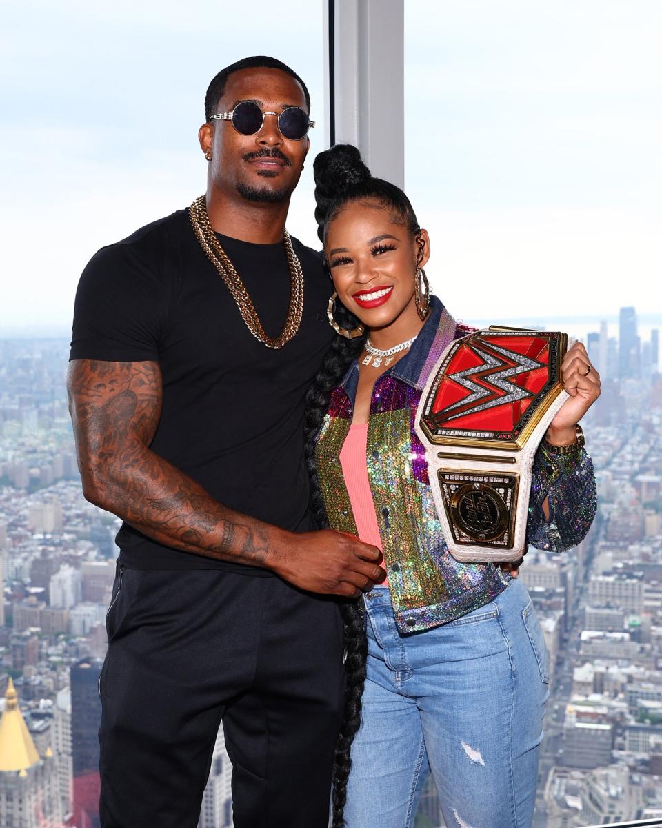 Montez Ford and Bianca Belair Visit the Empire State Building at The Empire State Building on July 25, 2022 in New York City.