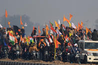 Farmers take part in a rally as they continue to demonstrate against the central government's recent agricultural reforms in New Delhi on January 26, 2021. (Photo by Money SHARMA / AFP) (Photo by MONEY SHARMA/AFP via Getty Images)