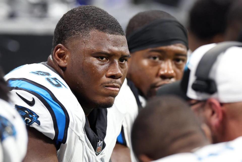 Carolina Panthers defensive end Derrick Brown listens to a coach along the sideline during action against the Atlanta Falcons at Mercedes-Benz Stadium in Atlanta, GA on Sunday, September 10, 2023. The Falcons defeated the Panthers 24-10.