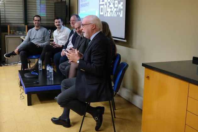 Luis Guimarãis, at far left, listens as Pedro de Sampaio Nunes, on the right, speaks at a student-organized nuclear energy seminar at University of Lisbon's Instituto Superior Técnico on Nov. 14.