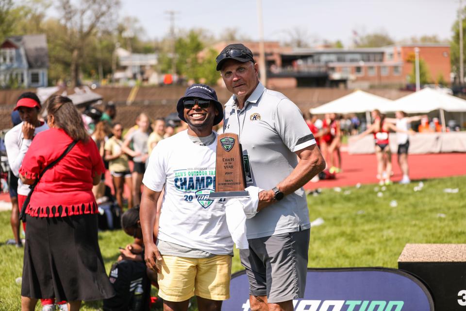 Kent State Director of Athletics Randale Richmond (left) and Director of Track and Field Bill Lawson pose after Lawson was named MAC Coach of the Year following last Saturday's victory at the MAC Outdoor Men's Track and Field Championships.