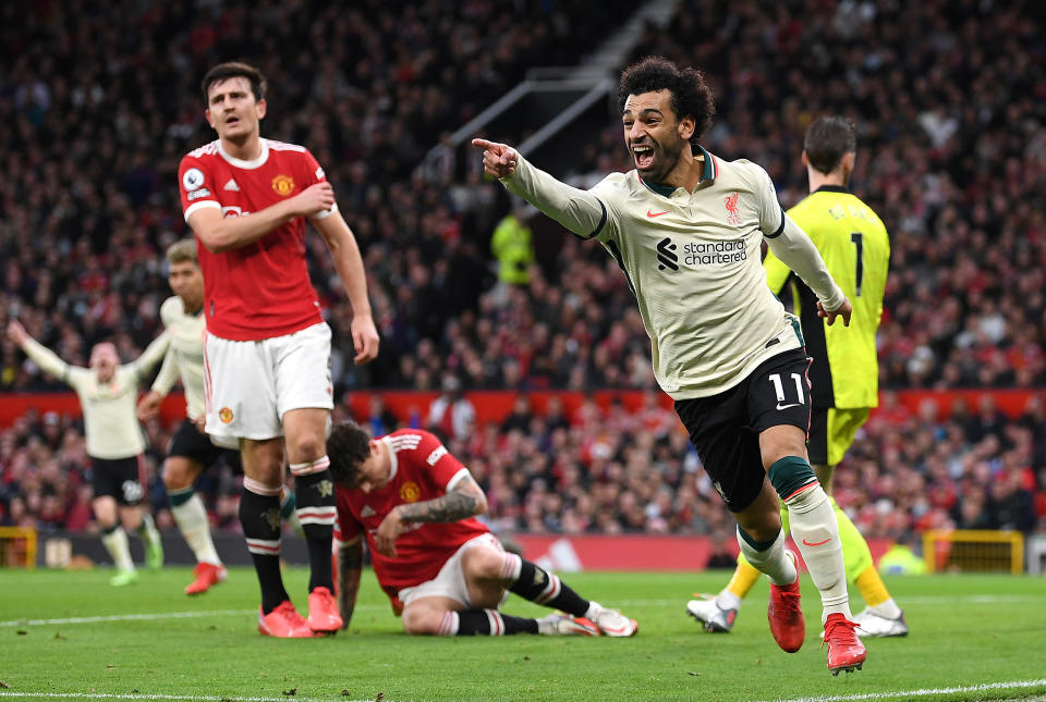 Liverpool's Mohamed Salah is seen here celebrating a goal after scoring against Manchester United.