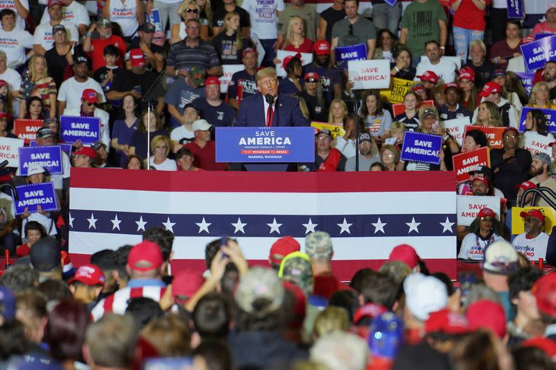 FILE PHOTO: Former U.S. President Donald Trump holds a rally in Warren, Michigan