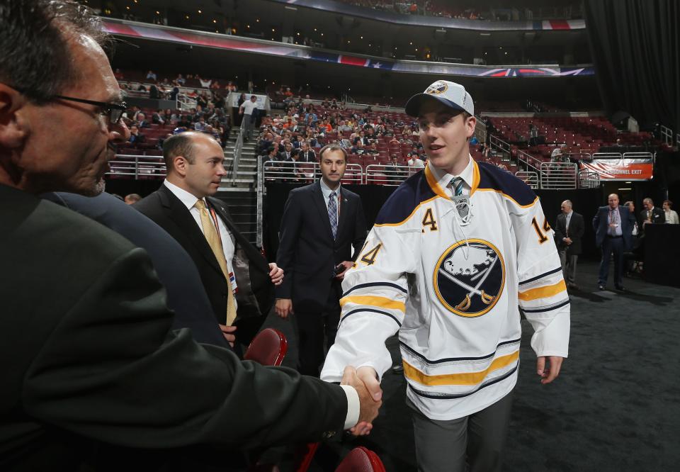 PHILADELPHIA, PA - JUNE 28: Brycen Martin meets his team after being drafted #74 by the Buffalo Sabres on Day Two of the 2014 NHL Draft at the Wells Fargo Center on June 28, 2014 in Philadelphia, Pennsylvania. (Photo by Bruce Bennett/Getty Images)