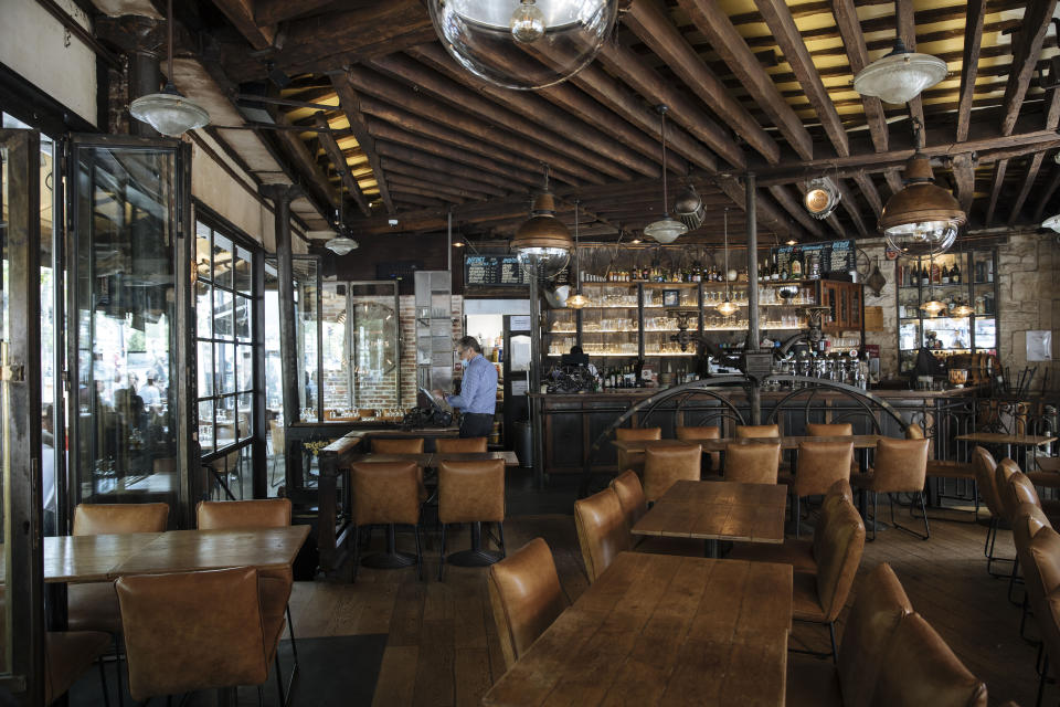 Inside Le Jaures restaurant a day prior the nationwide reopening of the restaurants interior, in Paris, France, Tuesday, June 8, 2021. (AP Photo/Lewis Joly)