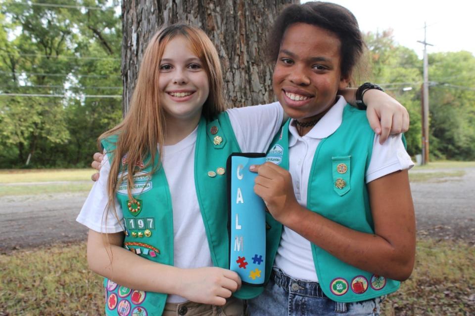 Girl Scouts (from left) Emilee Spaw and Jayde Love.