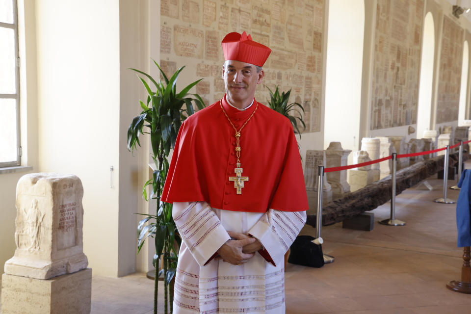 New Cardinal François-Xavier Bustillo, Bishop of Ajaccio poses for a photo at the end of the consistory where Pope Francis elevated 21 new cardinals in St. Peter's Square at The Vatican, Saturday, Sept. 30, 2023. (AP Photo/Riccardo De Luca)