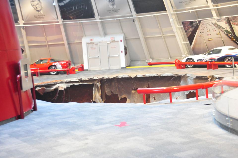 National Corvette Museum photo shows a sink hole that swallowed eight Corvettes in Bowling Green, Kentucky, in this image released to Reuters on February 12, 2014. REUTERS/National Corvette Museum/Handout via Reuters (UNITED STATES - Tags: TRANSPORT DISASTER) ATTENTION EDITORS - NO SALES. NO ARCHIVES. FOR EDITORIAL USE ONLY. NOT FOR SALE FOR MARKETING OR ADVERTISING CAMPAIGNS. THIS IMAGE HAS BEEN SUPPLIED BY A THIRD PARTY. IT IS DISTRIBUTED, EXACTLY AS RECEIVED BY REUTERS, AS A SERVICE TO CLIENTS