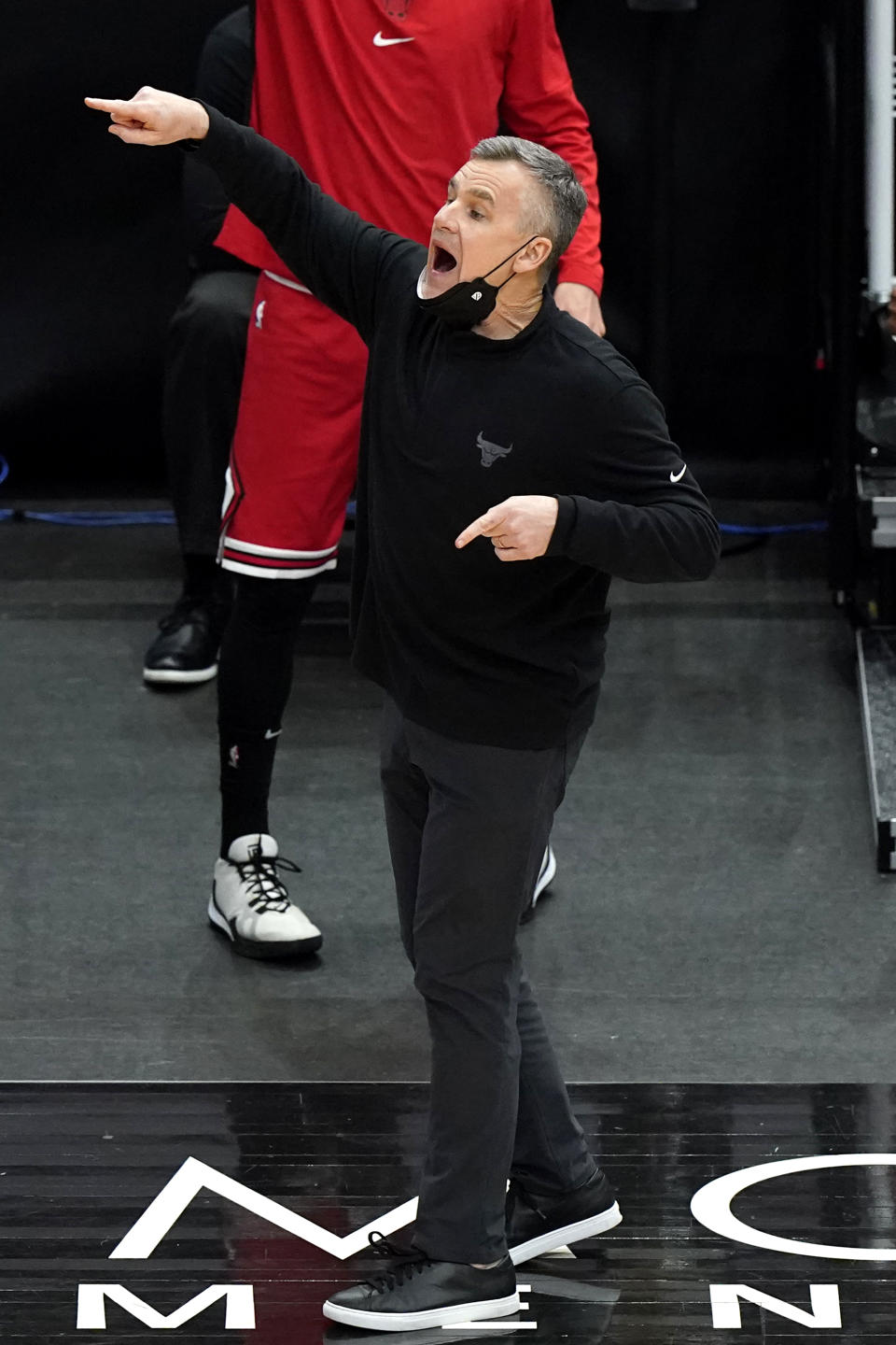 Chicago Bulls coach Billy Donovan gives out directions to the team during the first half of an NBA basketball game against the Toronto Raptors in Chicago, Thursday, May 13, 2021. (AP Photo/Nam Y. Huh)