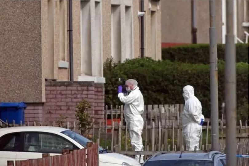 Police forensics examine the scene after Tony's death in 2019.