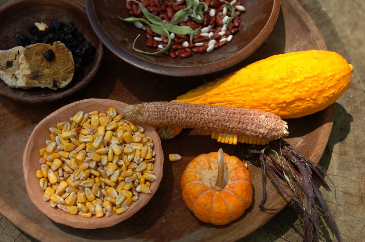 wooden platter of natural foods from the harvest