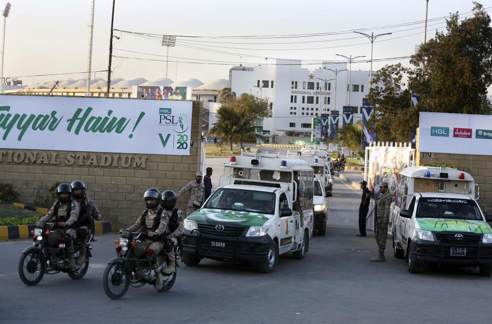 In this Monday, Feb. 17, 2020, photo, Pakistan paramilitary soldiers patrol at the vicinity of National stadium to ensure security for upcoming Pakistan Super League, in Karachi, Pakistan. Security concerns stopped foreign cricketers from touring Pakistan four years ago when the country's premier domestic Twenty20 tournament was launched, forcing organizers to stage the event on neutral turf in the United Arab Emirates. When the 2020 edition of the PSL starts in Karachi on Thursday, Darren Sammy of the West Indies and Shane Watson of Australia will be among 36 foreign cricketers involved in the six franchises. (AP Photo/Fareed Khan)