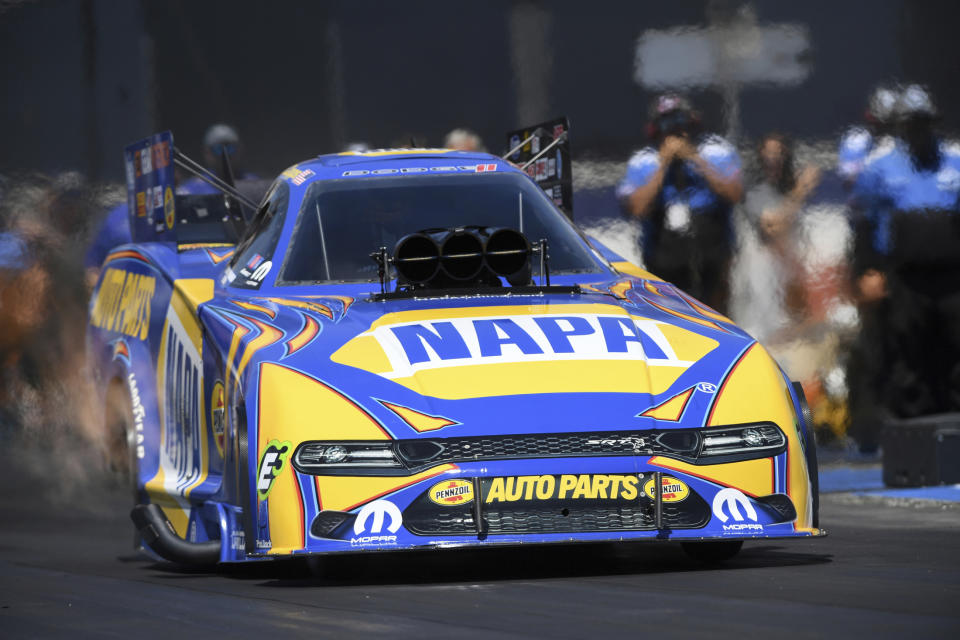 In this photo provided by the NHRA, Ron Capps wins at Auto Club Raceway at Pomona with his 4.151-second run at 297.75 mph over J.R. Todd in the Funny Car final at the 61st annual Lucas Oil NHRA Winternationals auto race, Sunday, Aug. 1, 2021, in Pomona, Calif. (Marc Gewertz/NHRA via AP)