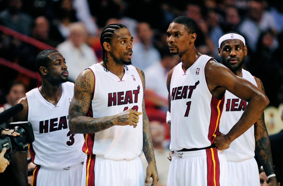 Nov. 17, 2010; Miami, FL, USA; Miami Heat players (from left) guard (3) Dwyane Wade , forward (40) Udonis Haslem , forward (1) Chris Bosh and forward (6) LeBron James against the Phoenix Suns at the American Airlines Arena. Miami defeated Phoenix 123-96. Mandatory Credit: Mark J. Rebilas-USA TODAY Sports