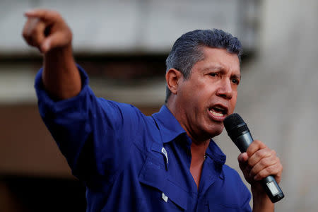 FILE PHOTO: Venezuelan presidential candidate Henri Falcon of the Avanzada Progresista party, delivers a speech to supporters during a campaign rally in Caracas, Venezuela May 14, 2018. REUTERS/Carlos Garcia Rawlins/File Photo