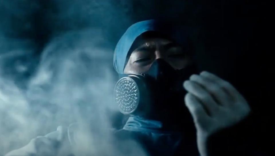 Lab worker pouring chemicals down the lab drain in The Host