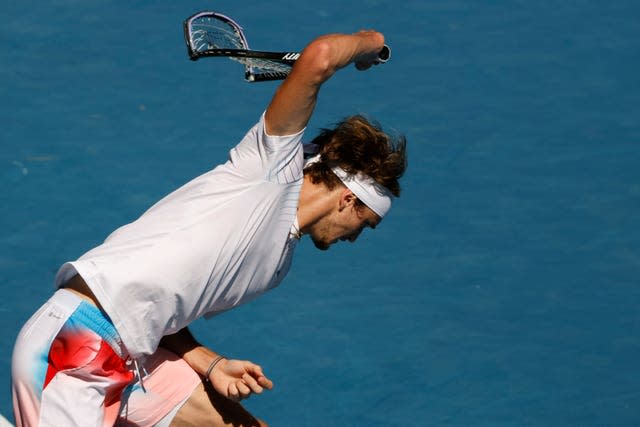 Alexander Zverev smashes his racket in frustration