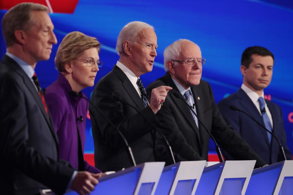 From left, Tom Steyer, Sen. Elizabeth Warren of Massachusetts, former Vice President Joe Biden, Sen. Bernie Sanders of Vermont and Mayor Pete Buttigieg of South Bend, Indiana, at the Democratic presidential primary debate on Jan. 14, 2020, in Des Moines, Iowa.