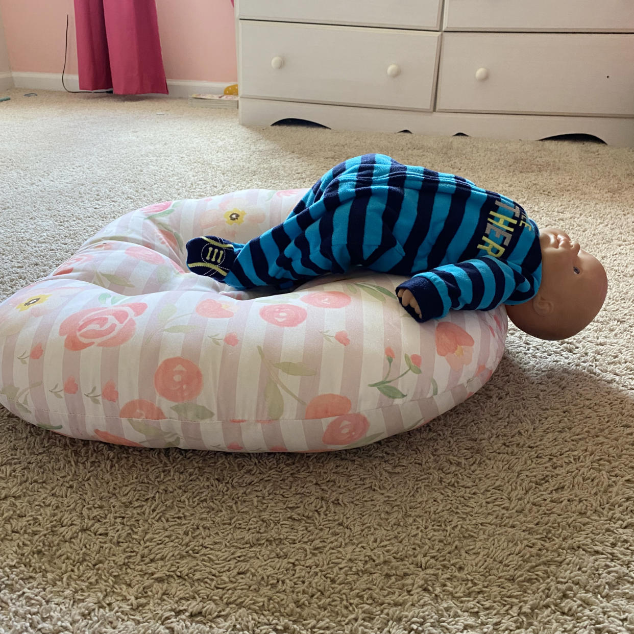 Image: A 3-month-old was found hanging off a Boppy lounger after the child kicked her legs, pushing herself upward, according to a report submitted by a parent to the CPSC in 2020. (Consumer Product Safety Commission)
