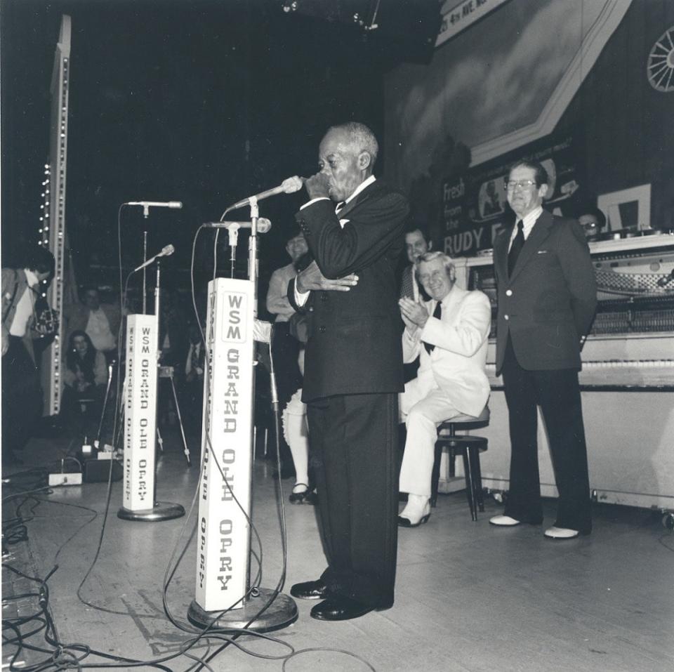 DeFord Bailey performing on the Grand Ole Opry stage