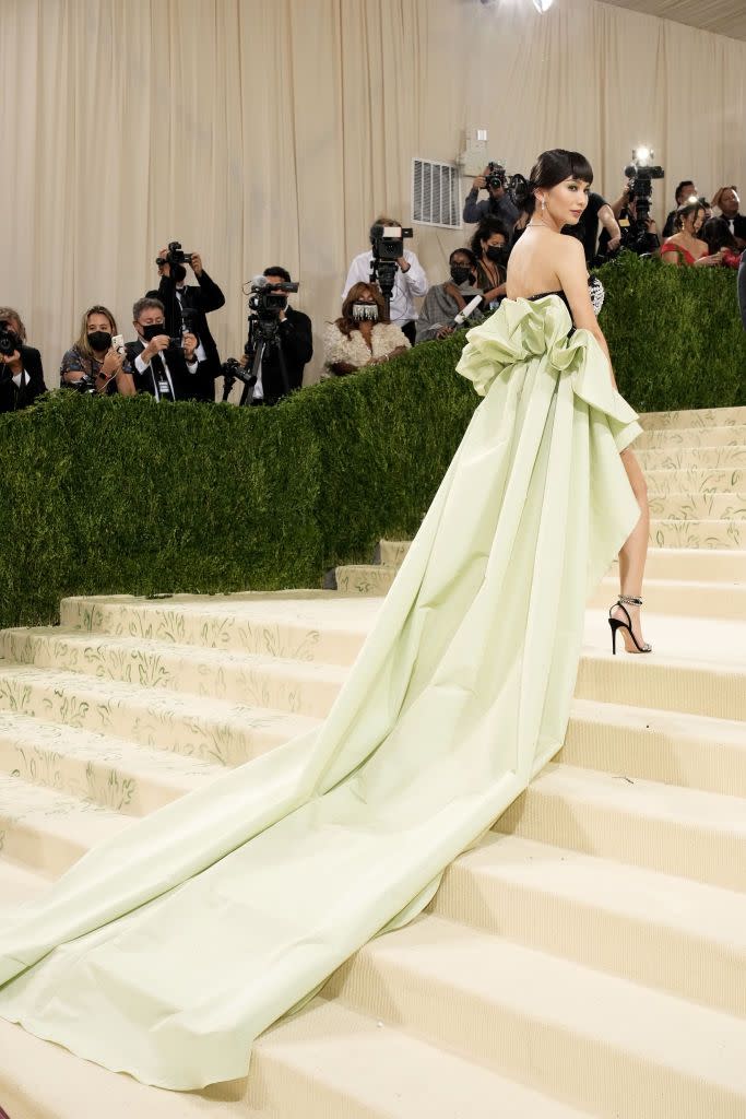 <p>British actress Gemma Chan pulled out all the stops with her embellished Prabal Gurung mini dress, which featured a dramatic mint-green train. The dress was a tribute to Anna May Wong, the first Chinese-American film star of Hollywood’s golden era. "A trailblazer, fashion icon and woman ahead of her time – she paved the way for those who came after and continues to inspire," Chan wrote.</p>