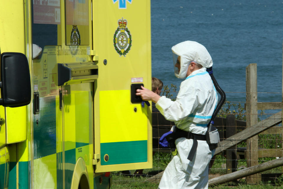 Paramedics rushed to the scene after reports that a woman had got into difficulty in the sea.  (SWNS)