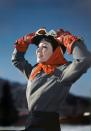 <p>The Hollywood film star spends the holidays on the slopes in Sun Valley Idaho. She wears a muted snow suit with orange accessories and is the epitome of a snow bunny.</p>