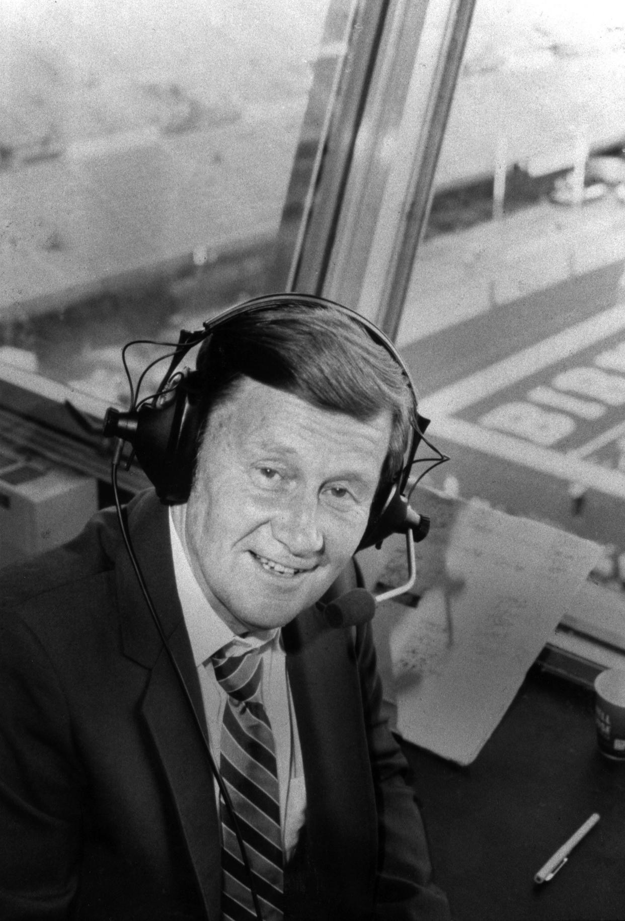 Announcer Larry Munson is pictured in the booth at Legion Field in Birmingham, Alabama as he prepares to broadcast a USFL football game between the Jacksonville Bulls and Birmingham Stallions on May 11, 1984. [Times-Union file]