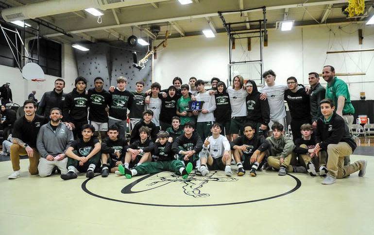 The South Plainfield wrestling team poses after winning the Central Group 3 title on Feb. 8, 2023