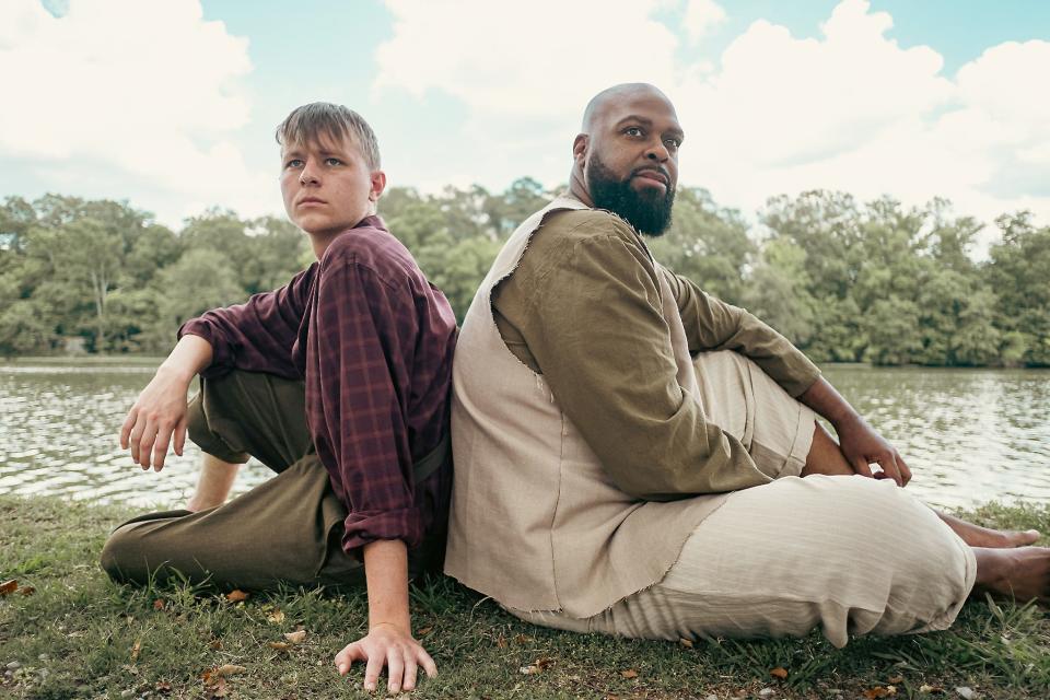 Dave Ritschard portrays Huck Finn and John Christopher Adams portrays Jim in Theatre of Gadsden's production of "Big River."