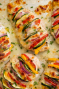 <p>This is the opposite of boring, flavourless chicken breast. It's literally packed with colourful flavour. Bonus: It's insanely good for you! </p><p>Get the <a href="https://www.delish.com/uk/cooking/recipes/a28895331/primavera-stuffed-chicken-recipe/" rel="nofollow noopener" target="_blank" data-ylk="slk:Primavera Stuffed Chicken" class="link ">Primavera Stuffed Chicken</a> recipe.</p>