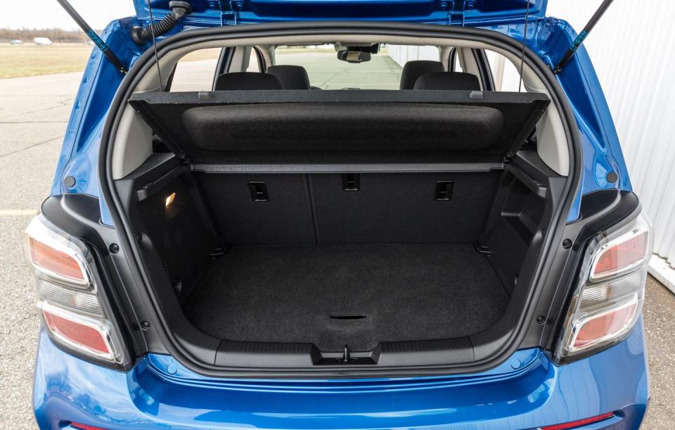 <p>A quick folding of the rear seats expands cargo volume to 48 cubic feet, and we fit 15 airline-carry-on-sized boxes back there.</p>
