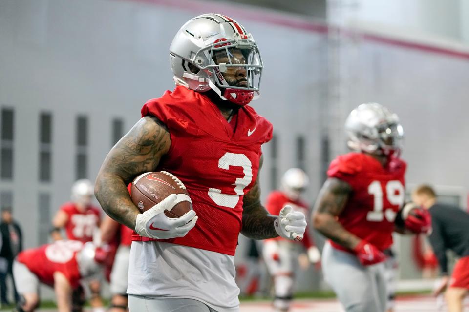 Mar 7, 2023; Columbus, Ohio, USA;  Ohio State Buckeyes running back Miyan Williams (3) runs during spring football drills at the Woody Hayes Athletic Center. Mandatory Credit: Adam Cairns-The Columbus Dispatch