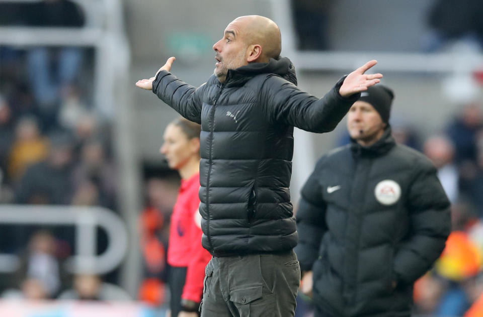 A frustrated Pep Guardiola sees his side lose more ground in the title race. (Photo by Owen Humphreys/PA Images via Getty Images)