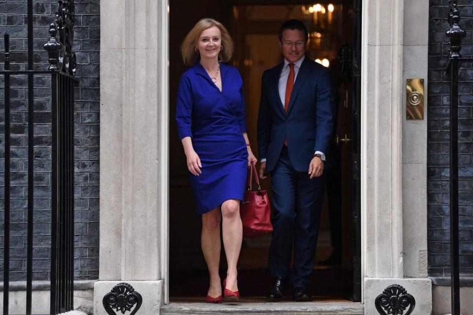 Liz Truss was all smiles as she left 10 Downing Street after being made Foreign Secretary (AFP via Getty Images)
