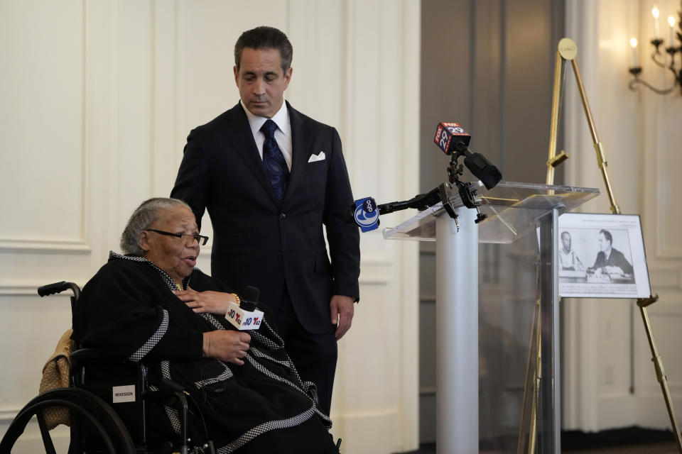 Susie Williams Carter, left, speaks during a news conference with lawyer Joseph Marrone, Monday, May 20, 2024, in Philadelphia. Carter, the sister of the youngest person ever executed in the state of Pennsylvania, Alexander McClay Williams, 16, is suing the county where the Black teenager was convicted in 1931. The suit comes two years after Williams' conviction by an all-white jury was vacated. (AP Photo/Matt Slocum)