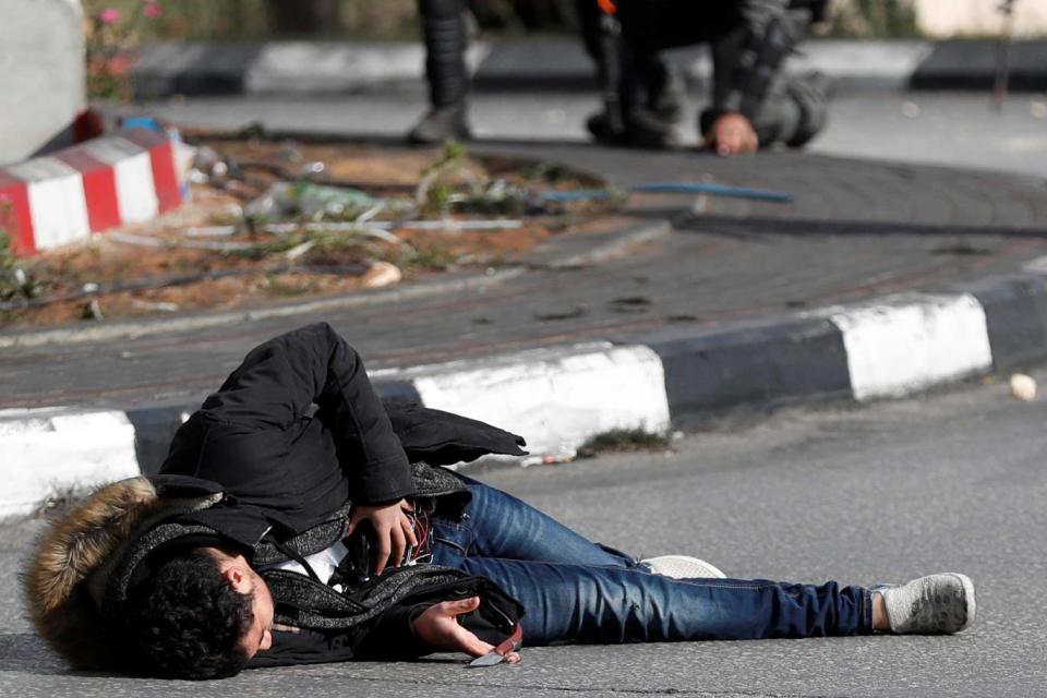 A Palestinian was shot and injured after he attacked an officer with a knife on 15 December 2017 near Ramallah. While the assailant was wearing a suicide vest, it is not clear whether the explosives were real (Reuters)